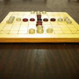 Close-up of 25-piece Hnefatafl Game, set out for play.