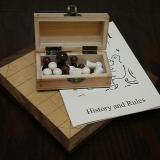 The Deluxe 13-piece Hnefatafl Game, with pieces in the box.